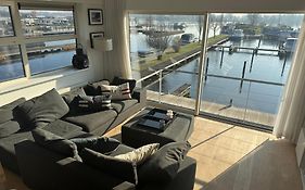 The Boathouse With Boat